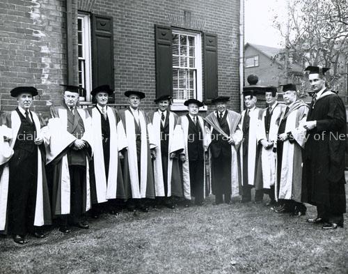 Honorary degree recipients with Lord Beaverbrook and Colin B. MacKay standing outside Beaverbrook House, UNB’s new law faculty building. UA PC 9e no. 3(8)