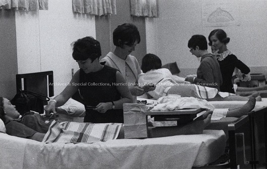 Nursing students practice in a mock hospital ward Record group/Fonds PR; Series 1; Sub-series 6; Item 7587 [between 1970 & 1971]